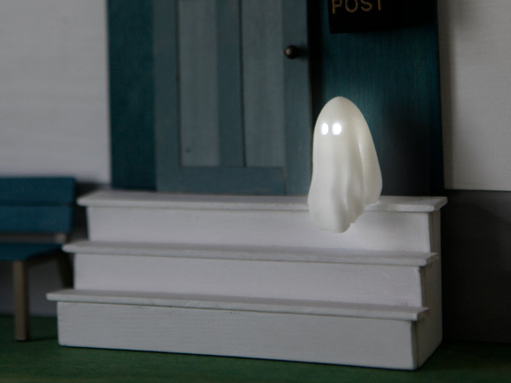 Miniatur Gespenst sitzend